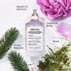Perfume bottle labeled 'Isparta Rose' with floral and greenery elements on a white background