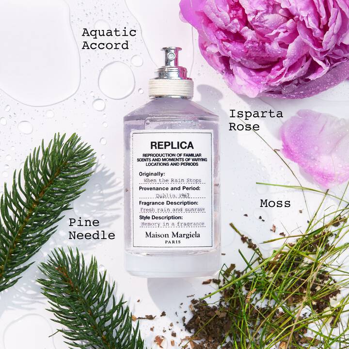 Perfume bottle labeled 'Isparta Rose' with floral and greenery elements on a white background