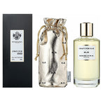 120ml bottle of 'Crazy for Oud' Eau De Parfum by Mancera, alongside its packaging and a metallic drawstring pouch. The perfume bottle is clear with a gold cap, and the packaging is primarily black with white text.