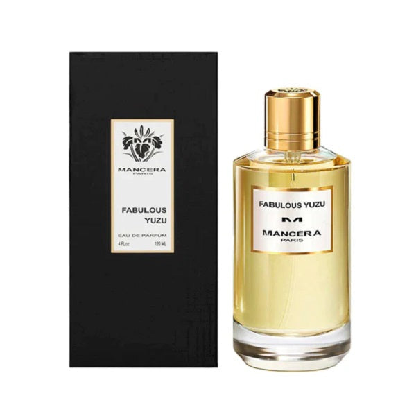 A bottle of Fabulous Yuzo Eau De Parfum by Mancera with a black box in the background. The bottle has a clear liquid, possibly perfume, and a gold-colored cap.