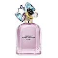 Pink perfume bottle with decorative cap on a white background