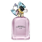 Pink perfume bottle with decorative cap on a white background