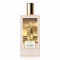 A frosted glass perfume bottle for MEMO PARIS Cap Camarat, featuring a warm sepia-toned illustration of a lighthouse on the front label and a shiny gold cylindrical cap, set against a plain white background.