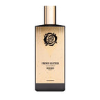 Perfume bottle labeled 'French Leather' by Memo on a white background