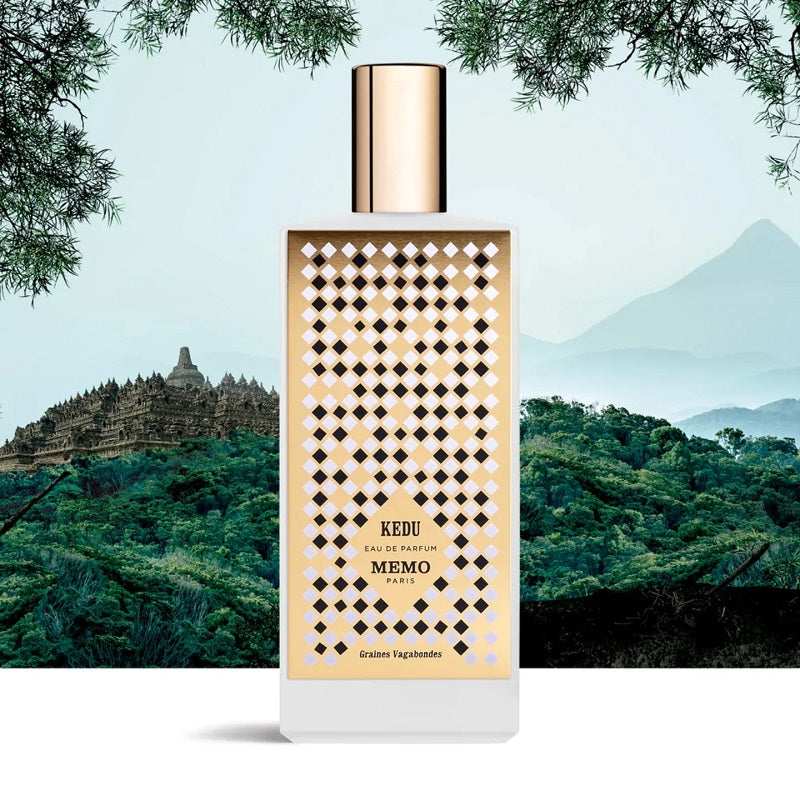 Perfume bottle with decorative label against a scenic background