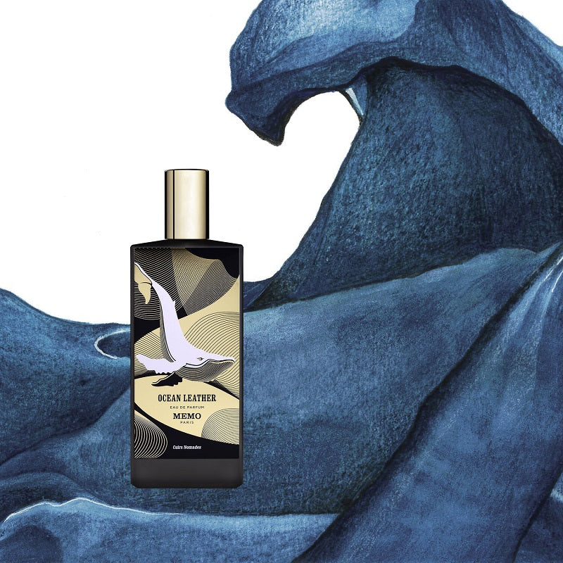 Perfume bottle labeled 'Ocean Leather' by Memo against a blue wave background