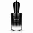 A black gradient perfume bottle with a faceted black cap, labeled 'MIND GAMES MENTOR EXTRAIT DE PARFUM', on a clean white background.