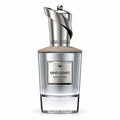 Mind Games Queening perfume bottle with a silver metallic cap, clear glass body, and a light beige textured lid, shown on a white background.