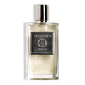 A transparent glass bottle of Incensum Eau de Parfum by Mizensir with a white label and cap.