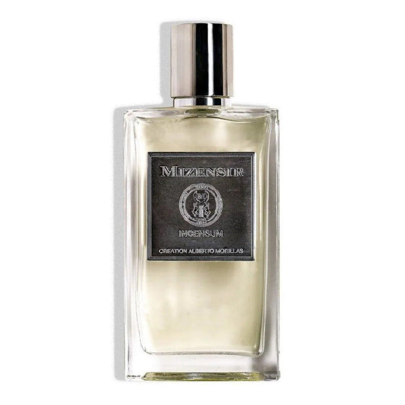 A transparent glass bottle of Incensum Eau de Parfum by Mizensir with a white label and cap.