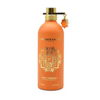 A bottle of Montale Holy Neroli Eau de Parfum with a orange label and cap, featuring floral and citrus imagery.