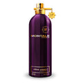 A purple bottle of Montale Aoud Greedy Eau de Parfum with a gold cap.