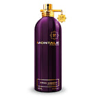 A purple bottle of Montale Aoud Greedy Eau de Parfum with a gold cap.