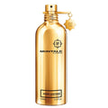 A gold-colored bottle of Montale Aoud Leather Eau de Parfum with a spray nozzle and a branded label.