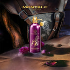 Montale Paris Arabian Rose Leather perfume bottle with a leather bag and rose petals in the background
