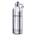 A silver bottle of Montale Chocolate Greedy Eau de Parfum with a black label and a decorative element on the cap.