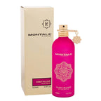 Pink perfume bottle with packaging on a white background