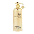 A gold-colored bottle of Montale Golden Aoud Eau de Parfum with a spray nozzle and a crystal-like attachment.