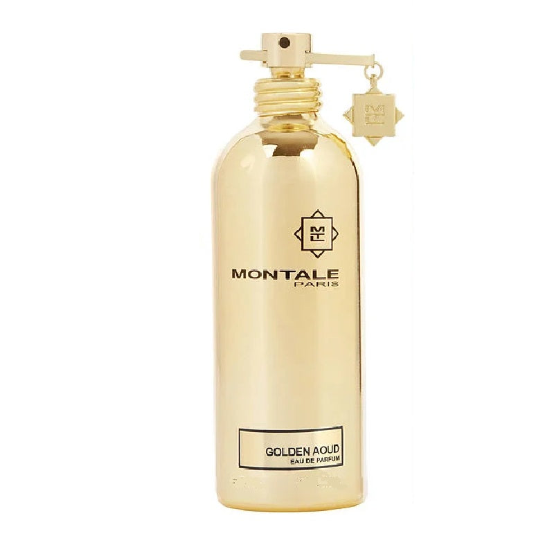 A gold-colored bottle of Montale Golden Aoud Eau de Parfum with a spray nozzle and a crystal-like attachment.
