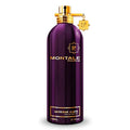 A purple bottle of Montale Intense Cafe Eau de Parfum with a gold cap and Montale branding.