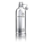 A silver bottle of Montale Mango Manga Eau de Parfum with a black cap and brand logo on the front.