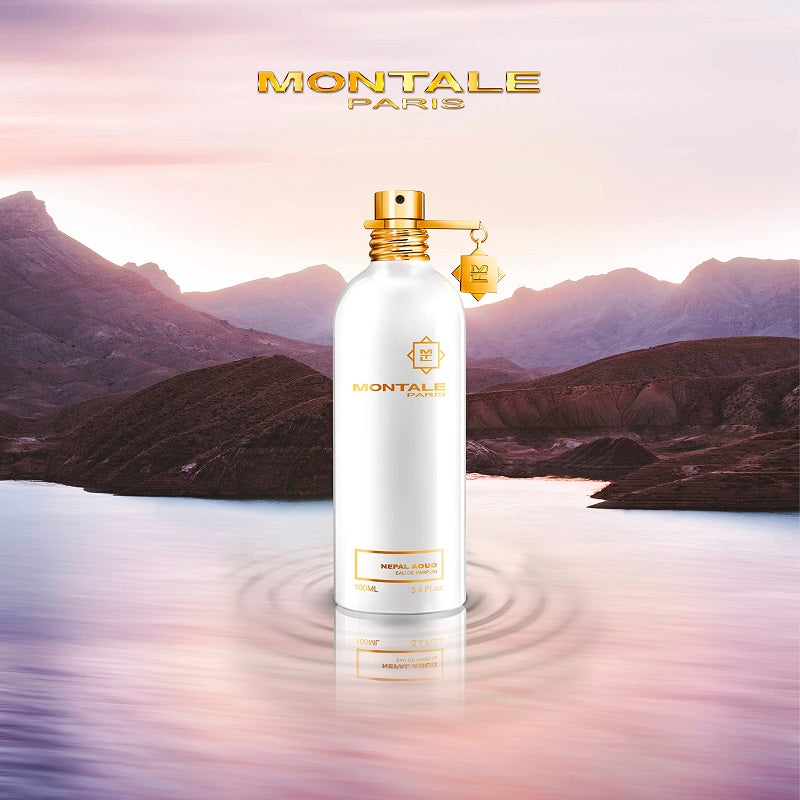 Montale Paris perfume bottle with a mountain and lake background