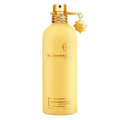 Yellow perfume bottle with gold cap on a white background