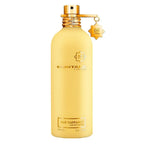 Yellow perfume bottle with gold cap on a white background