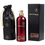 Montale Paris Red Vetiver perfume set with bottle, packaging, and drawstring bag on a white background