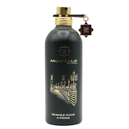 A black bottle of Montale Rendez-vous a Paris eau de parfum with a gold cap and a charm featuring the Eiffel Tower.