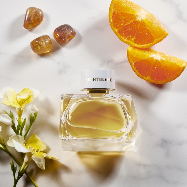Montblanc Signature Absolue 90ml Eau de Parfum lifestyle image inspired by golden pear, radiant florals, amber light and contemporary feminine elegance.