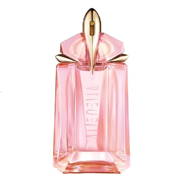 Pink perfume bottle with gold cap on a white background