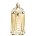 Gold and clear perfume bottle with 'Viktor & Rolf' branding on a white background