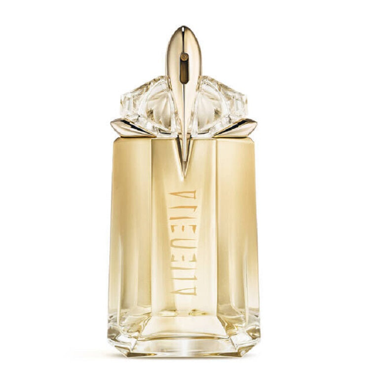 Gold and clear perfume bottle with 'Viktor & Rolf' branding on a white background
