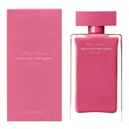 Pink perfume bottle and packaging of 'fleur musc' by Narciso Rodriguez on a white background