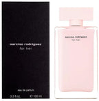 Pink perfume bottle and black packaging on white background