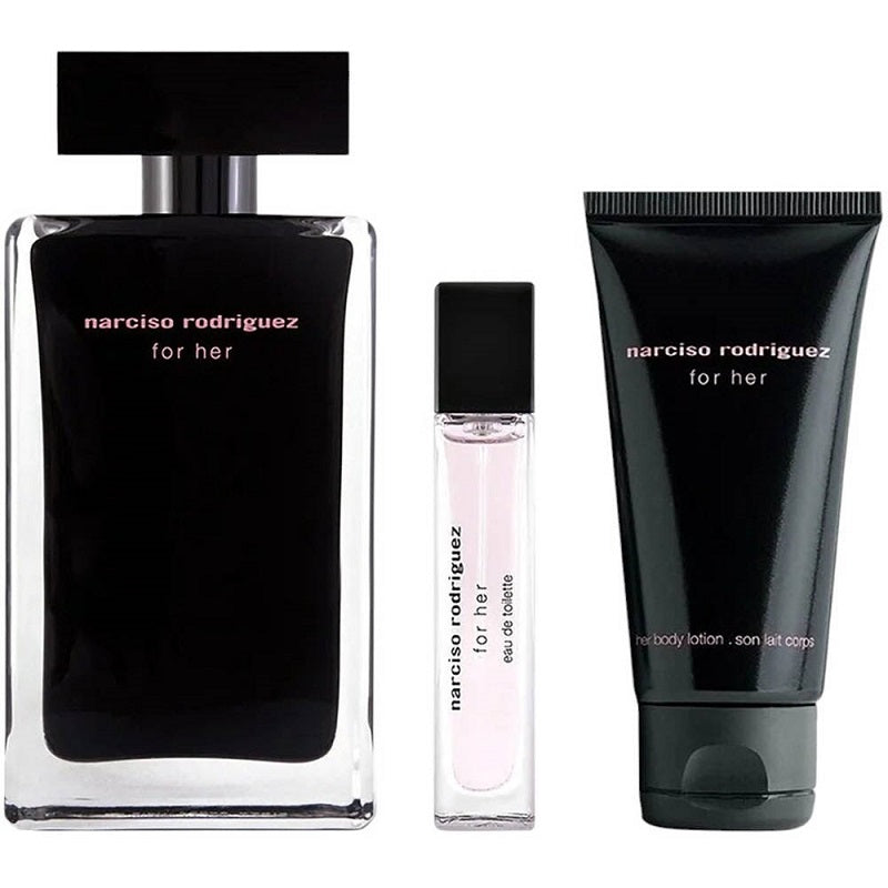 Set of Narciso Rodriguez perfume and body products on a white background