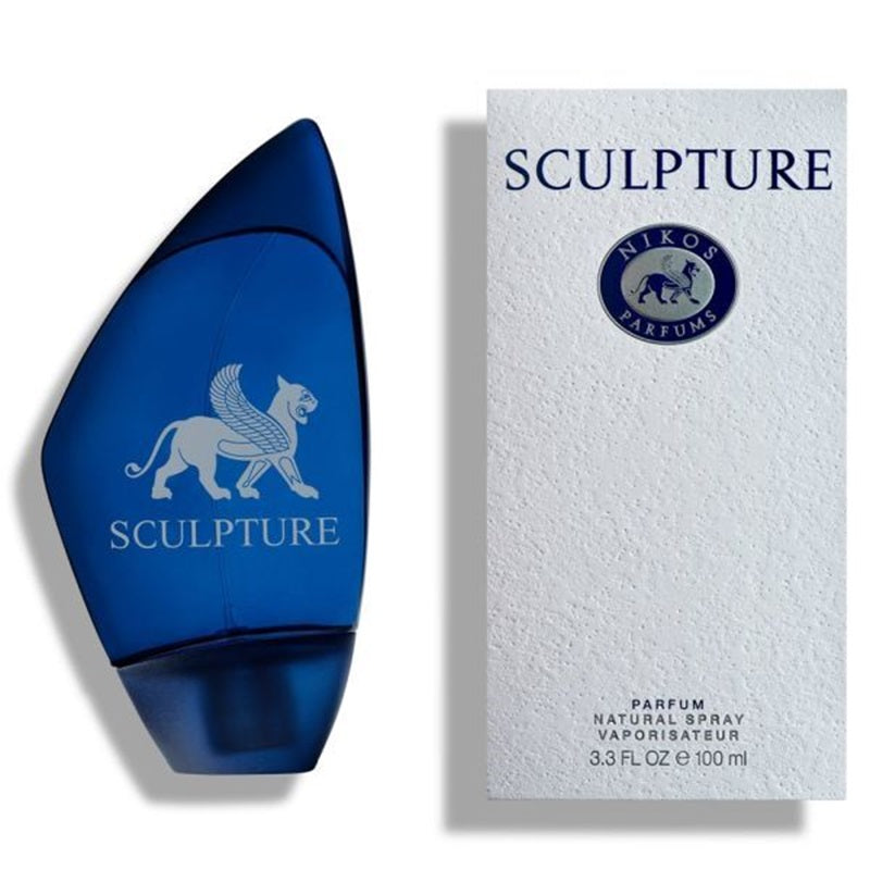 A blue sculptural perfume bottle next to its white packaging box. The bottle features a winged lion emblem and the word 'SCULPTURE' in white.