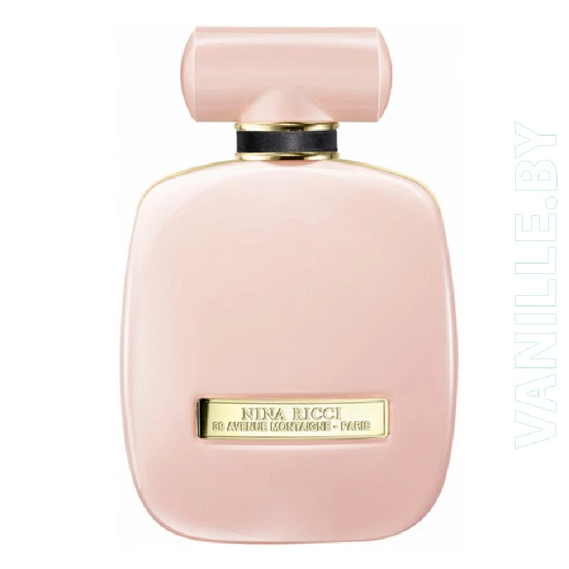 Pink Nina Ricci perfume bottle on a white background