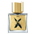 A square-shaped perfume bottle with a clear glass body and a gold-colored cap. The label has the text 'ANI X NISHANE Extract du Futur' and is marked with a large 'X' symbol.