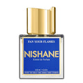A bottle of 'Fan Your Flames' Extrait de Parfum by Nishane with a blue label and a gold-colored cap.
