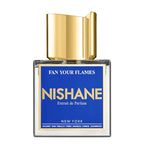 A bottle of 'Fan Your Flames' Extrait de Parfum by Nishane with a blue label and a gold-colored cap.