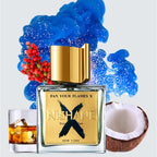 Nishane perfume bottle with blue smoke, berries, a glass of alcohol, and a coconut on a light gray background.