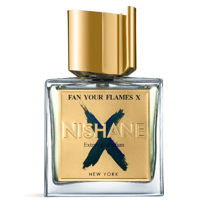 A bottle of Fan Your Flames X Extrait de Parfum by Nishane, with a gold cap and a label featuring the product name and brand.