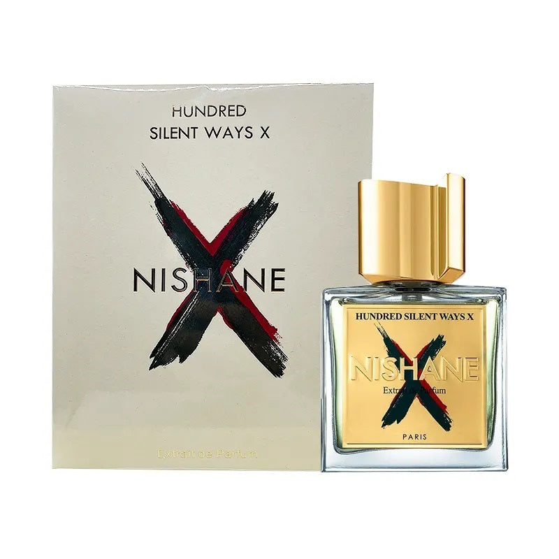 A product image featuring a perfume bottle with a gold cap and a label that reads 'Hundred Silent Ways X' by Nishane. The perfume bottle is accompanied by a card with the same text and a gold design.
