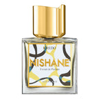 A square-shaped glass bottle of Kredo Extrait de Parfum by Nishane with a gold-colored cap and a label featuring geometric patterns in yellow, black, and white.