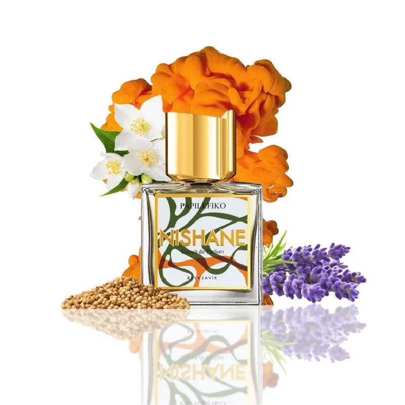 Nishane perfume bottle with orange flowers and lavender on a white background