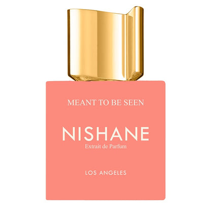 Nishane perfume bottle with gold cap on a white background