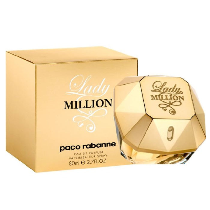 A gold-colored, faceted bottle of Paco Rabanne's Lady Million Eau de Parfum, accompanied by its packaging box.