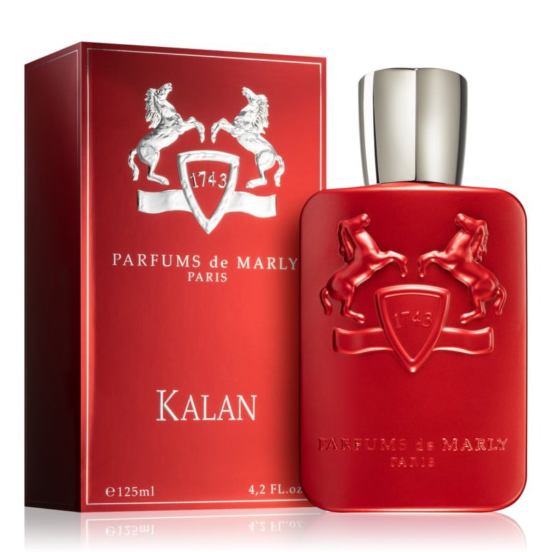 A red bottle of Kalan Eau de Parfum by Parfums De Marly, with a matching red box displaying the product name and brand logo.